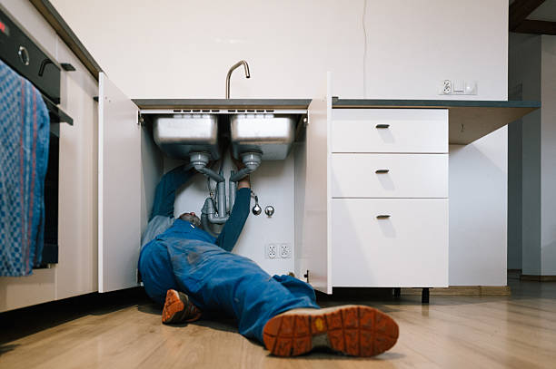 Professional Drain Cleaning technician working in Oakland, IA